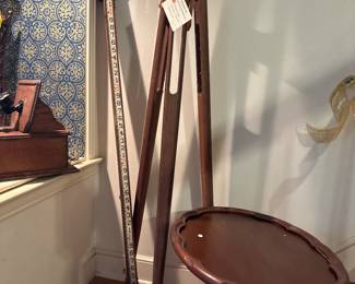 Antique wooden surveyors tripod and leveling rod