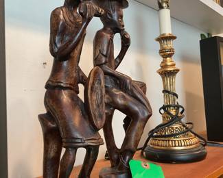 Hand carved wooden sculptures of man and woman 
