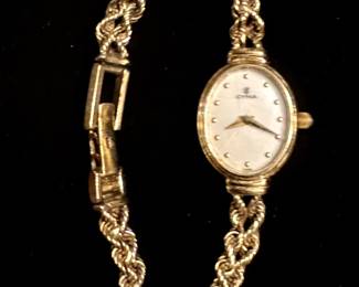 Cyma women's gold watch
