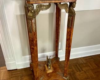 FRENCH EMPIRE FIGURED WALNUT PEDESTAL WITH GILT BRONZE MOUNTS