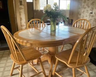Wooden Dining Table with White Tiled Top and Four Spindle Back Chairs