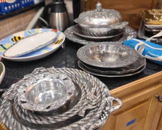Lots of pewter serving items