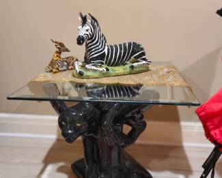 Panther glass-top table