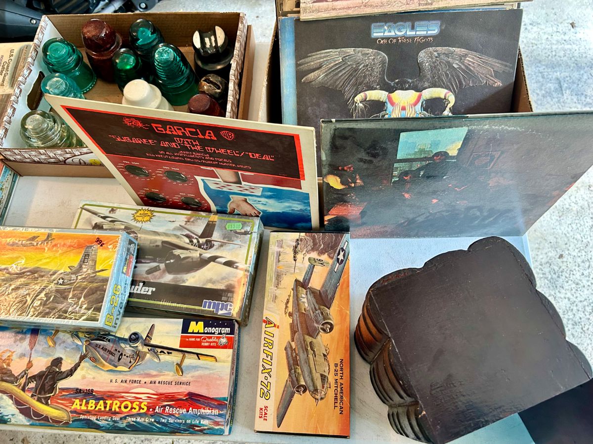 Glass insulators, vintage military models, albums