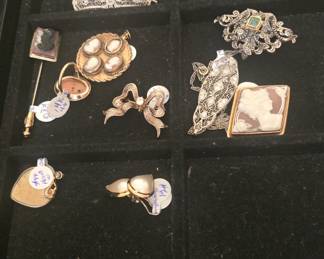 Broaches and pins and ring