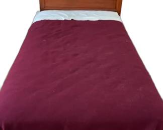 Wooden Bed Frame with Mattress & Red Bedding


