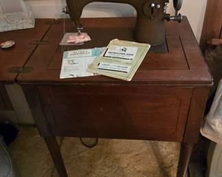 New Home Sewing Machine in Cabinet