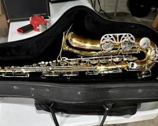 Saxophone and case