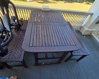 Solid wood outdoor table and benches