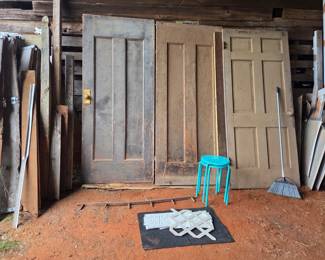Antique and vintage doors. The two on the left are original to the home and weigh a ton. There are a few more not pictured.