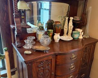 Sideboard with great carvings and turned wood.