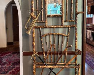 Burnt Bamboo Hall Tree Shown with Four Canes & Bugle. Hall Tree Measures 30" W x 76" H x 6.5" D. Photo 1 of 6. 