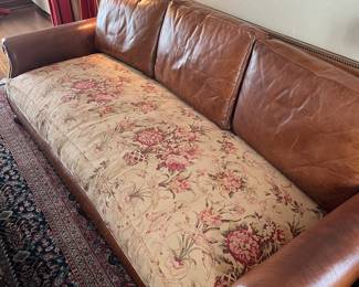 Ralph Lauren Home Roll Arm Leather Sofa. Comes with Two Custom Ralph Lauren Fabric Slipcovers -- Floral & Paisley Patterns. Measures 92" W x 42" D. Photo 2 of 6. 