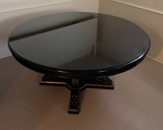 Ralph Lauren Black Lacquered Regency-Style Dining Table with Parcel Gilt Pedestal and Claw Feet. Comes with Glass Topper. Measures 60" D x 30" H with 27" Clearance. Photo 2 of 4. 