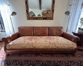Ralph Lauren Home Roll Arm Leather Sofa. Comes with Two Custom Ralph Lauren Fabric Slipcovers -- Floral & Paisley Patterns. Measures 92" W x 42" D. Photo 1 of 6. 
