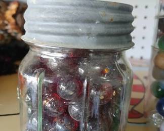 Red Marbles in Zinc Top Jar