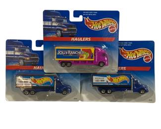 627 - 3 Hot Wheels Trucks in Packaging
