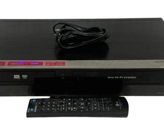 1935 - LG DVD Recorder / VHS Recorder w/ Remote used, untested, as-is electric/electronic/mechanical item. No guarantee all components are present
