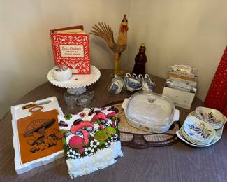 Round Formica kitchen table and (3) vinyl chairs......