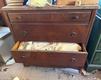 Antique chest of drawers filled with vintage sewing patterns