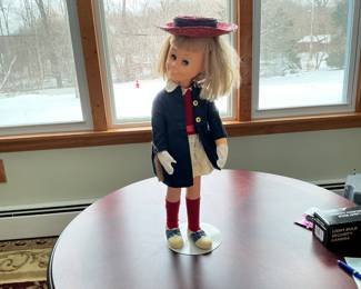 Multiple Chatty Cathy dolls, doll parts and doll clothing