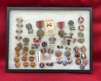 WWI And WWII Pins In Display Case 