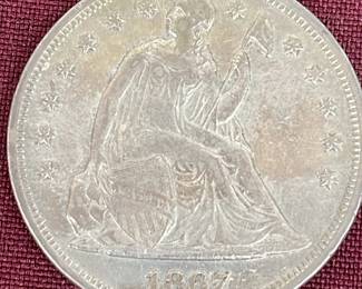 1867 Seated Liberty Dollar Coin
