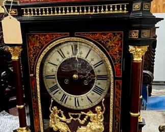 This is a fine French mantle clock, probably not more than 50 years old and in perfect condition. Very heavy.  Pictures of the cabinet base are coming