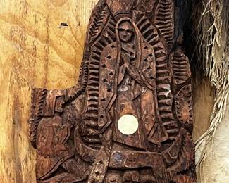 A carved wood Virgin Mary