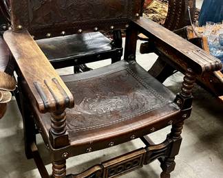 This leather and oak dining chair has 7 more that match. In fact, we have at least 8 sets of dining chairs!! All in great condition and nice a heavy.  