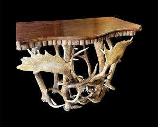 This is an amazing  piece. We have 2 of these tables that are hand made in Colorado by a couple who have this art down pat. Each one is different and truly one of a kind. 