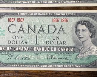 13 Uncirculated High-grade Canadian Centennial $1 Bills.