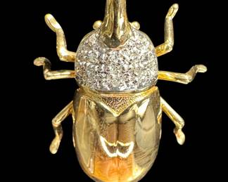 14k gold bug with diamonds and 14kt gold chain.
