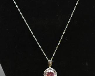 Sparkly pink pendant necklace with silver tone chain