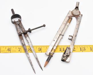 pair of vintage compasses