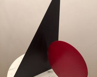 Signed abstract metal sculpture in the style of Calder
