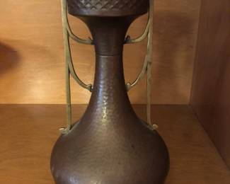Early 20th century English Art Noveau/ Arts & Crafts hand hammered copper candle holder
