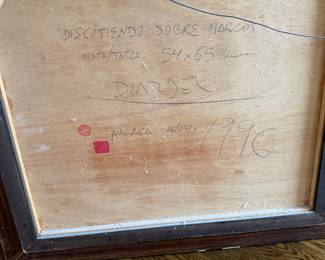 Back of Painting ‘Discutiendo Sobre Marcos’ by Diadel, 1996 – Mixed Media on Board with Signature and Label