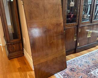 L12 - $600. Drexel Heritage Dynasty Collection Burled Walnut Dining Table With 8 Chairs (2 captains / 6 regular). Table Measures 66" x 45" x 29" tall. Includes 2 Leaves - Each Measures 22". Chairs Measure 22" x 19" x 42" tall. Overall very good condition. Some minor surface scratches and one leg has a piece of veneer missing that you have to really look to find. One captains chair has stained upholstery - might clean out? The others all look great.