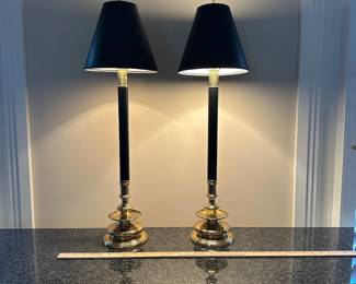 L6 - $95. Heavy & Very Nice Pair of Brass Candlestick Lamps. No name we can find but the sticker reads "Built with Pride By Peggy" on the bottom of both. Shades are both in very good condition! Measures 31.25" tall. 