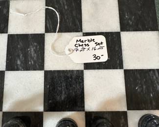L53 - $30. Marble chess set. Measures 16.25" square. No storage box. Some pieces have minor chips. 