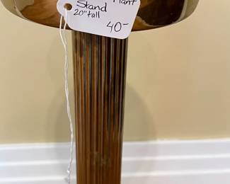 K5 - $40. Brass Pedestal Plant Stand. Measures 20" tall. Base is 9.5" wide. Top Can hold 6.25" planter. 
