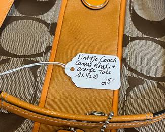K24 - $25. Vintage Coach Canvas Khaki and Orange Tote with Dust Cover. Measures 14" x 4" x 10"