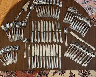 L49 - $275. Hampton Silversmiths Nobility Stainless Flatware. Service for 10 + extras. 73 Pieces total. 