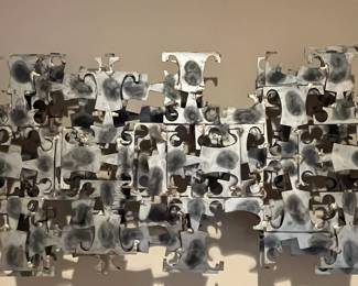L45 - $750. Marc Weinstein 3D Brutalist Metal Sculpture. Has Original Sticker. It can be hung horizontally or vertically. Measures 47" x 16".
