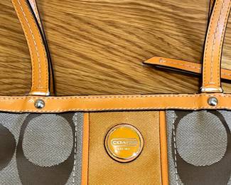 K24 - $25. Vintage Coach Canvas Khaki and Orange Tote with Dust Cover. Measures 14" x 4" x 10"
