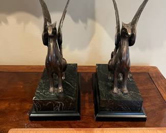 L34 - $30. Set of Vintage Bronze Griffin Bookends. Measures 6.25" x 4" x 9" tall. Faux Marble Base. 