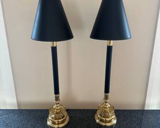 L6 - $95. Heavy & Very Nice Pair of Brass Candlestick Lamps. No name we can find but the sticker reads "Built with Pride By Peggy" on the bottom of both. Shades are both in very good condition! Measures 31.25" tall. 