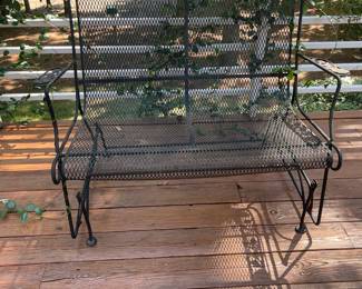 G12 - $125. Wrought Iron Glider Rocker in good condition - there is a bit of minor rust on the bolt areas. Measures 45" wide x 29" deep x 37" tall. Floor to seat is 18"