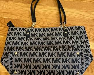 K23 - $30. Michael Kors Canvas Tote. Measures 14.75" x 4.75" x 9" tall. 